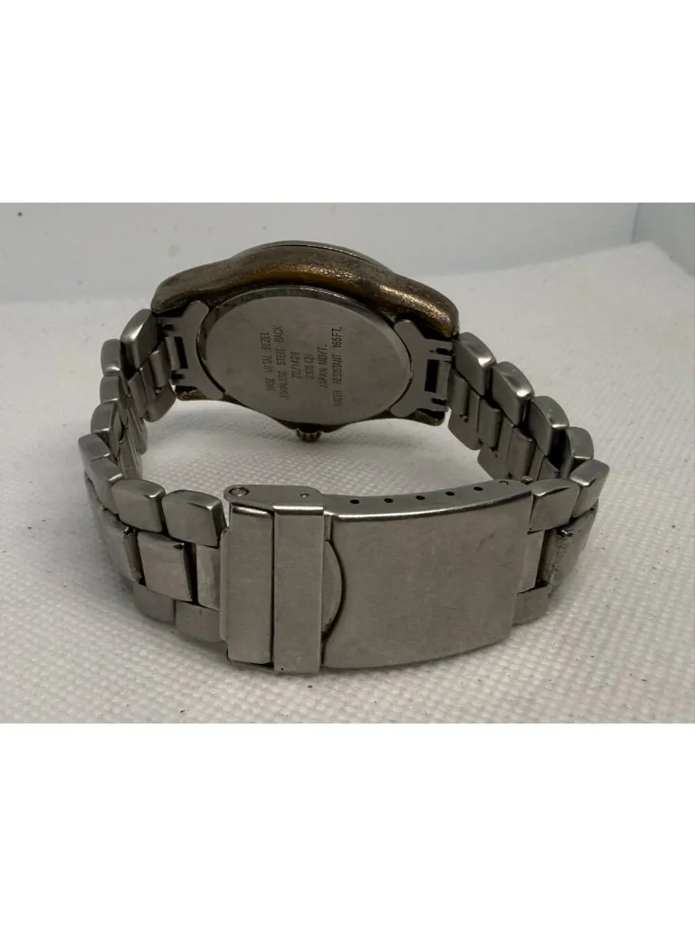 Armitron Men's SS Rotating Bezel Dark Grey Dial Day Date Bracelet Quartz Watch